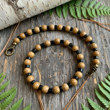 Load image into Gallery viewer, A handcrafted necklace with a combination of tiger jasper and brass beads, featuring a lobster clasp.
