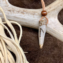 Load image into Gallery viewer, Handmade Norse rune necklace with carved antler pendant on leather cord