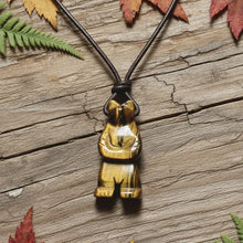 Load image into Gallery viewer, Hand carved gemstone bear totem pendant on leather necklace