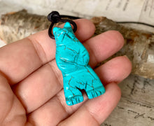 Load image into Gallery viewer, A bear totem necklace with a turquoise magnesite pendant