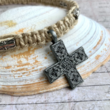 Load image into Gallery viewer, A thick hemp necklace with a pewter Celtic cross pendant, displayed on a seashell.