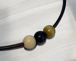 Leather Necklace with Wooden Ball Pendant – Modern Minimalist Style