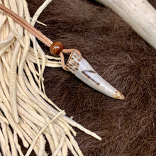Load image into Gallery viewer, Handmade Norse rune necklace with carved antler pendant on leather cord
