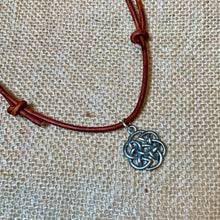 Load image into Gallery viewer, Close-up of pewter Celtic knot pendant on leather necklace
