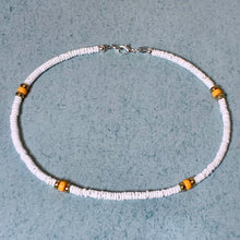 Load image into Gallery viewer, Sun &amp; Salt Puka Shell Necklace – Yellow Beach Shell Choker
