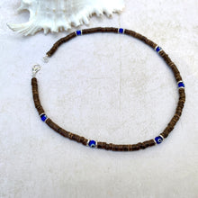 Load image into Gallery viewer, Evil Eye Talisman – Beach-Inspired Necklace - Coconut Shell &amp; Beads - Handmade Shell with Island Vibes
