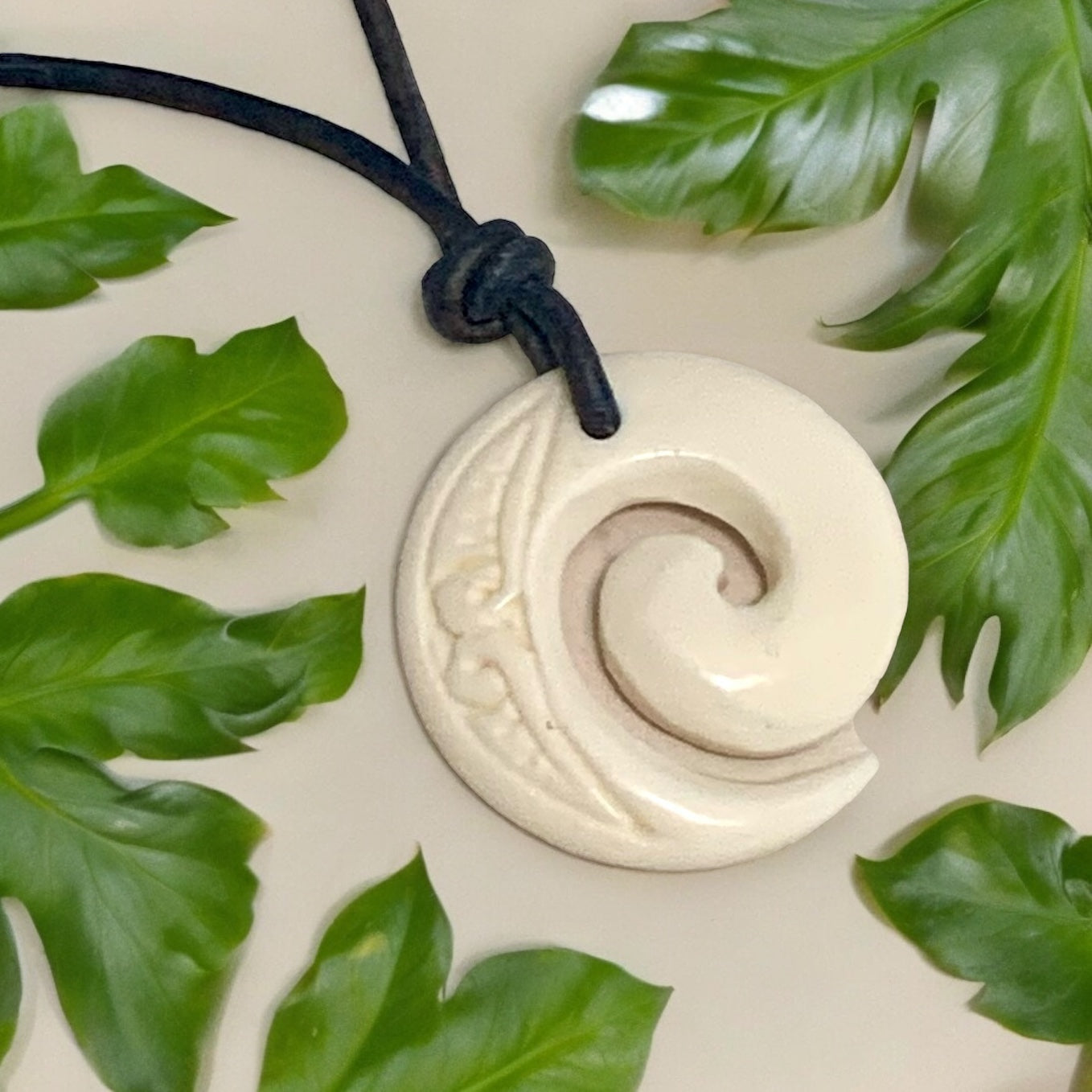 Hand carved bone necklace discount